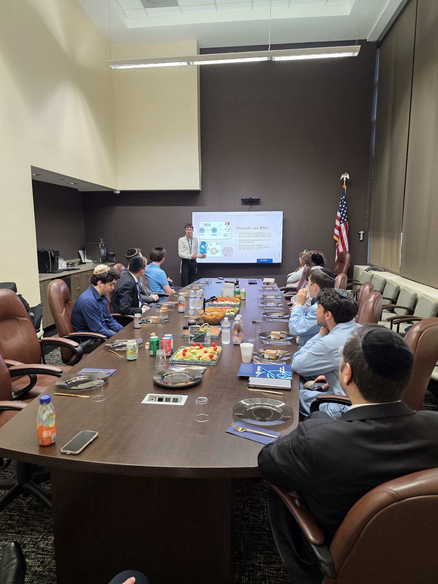Students at a lunch-and-learn presentation on stem cell research