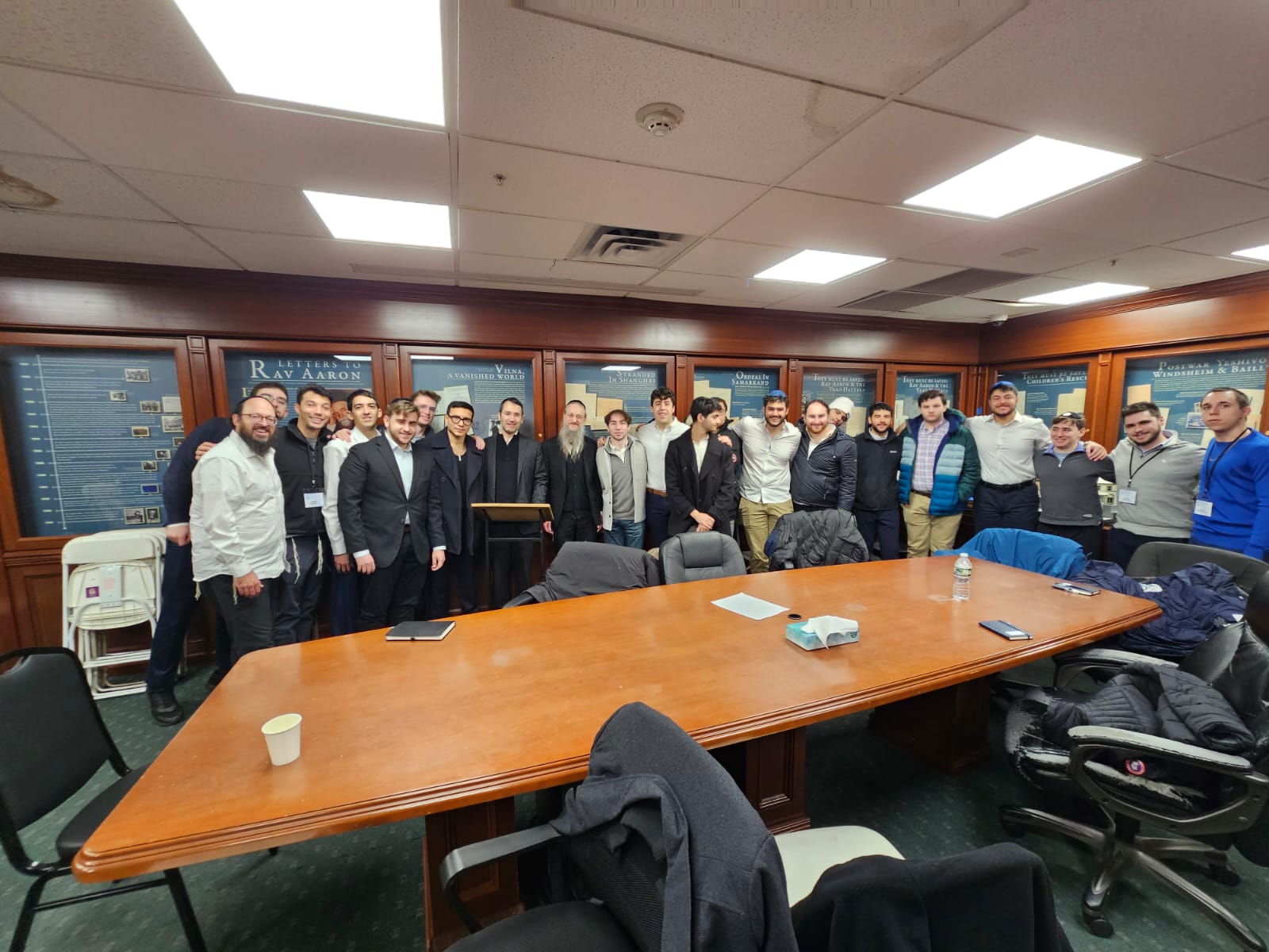Group photo of J³ Networking Week participants in the boardroom