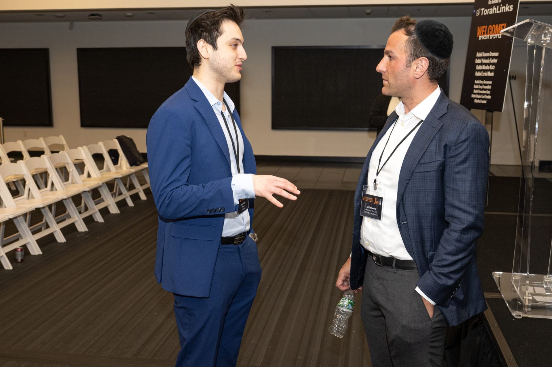 A student and professional in conversation at J³ 2026